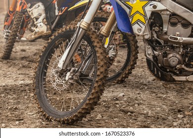 Close-up of the  wheel of a racing cross-country motorcycle after the race. Lifestyle. Moto sport.