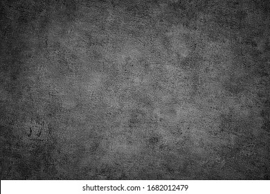Zwarte stenen cement achtergrond, kopieer ruimte. Grijze betonnen papiertextuur, plaatssjabloon voor tekst