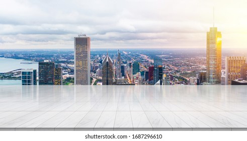 Business concept - Empty marble floor top with panoramic modern cityscape aerial view under sunrise and bright sky of Chicago, American, for display or montage product