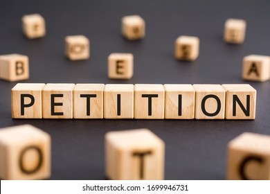 Petición - palabra de bloques de madera con letras, un concepto de petición de solicitud formal, letras aleatorias alrededor de fondo negro