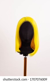 yellow wig short color hair on a mannequin