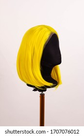 yellow wig short color hair on a mannequin