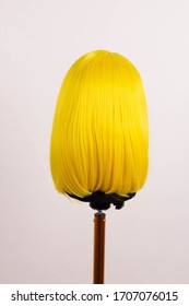 yellow wig short color hair on a mannequin