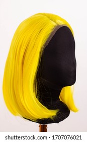 yellow wig short color hair on a mannequin