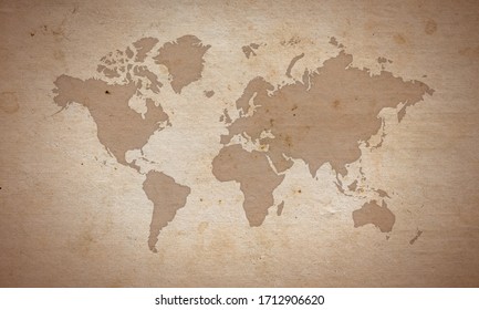 silueta del mapa mundial en la superficie de papel antiguo