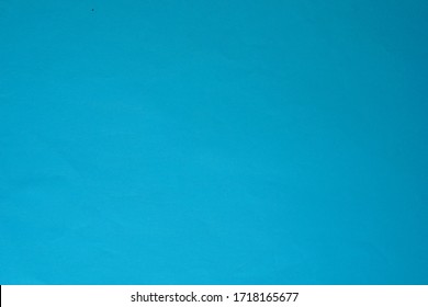 nền trừu tượng với bề mặt giấy màu xanh cho nền.