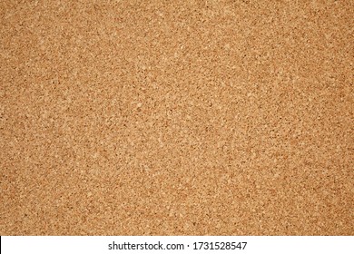 Brown / yellow color of cork board. Textured wooden background. Cork board with copy space. Notice board or bulletin board image. 