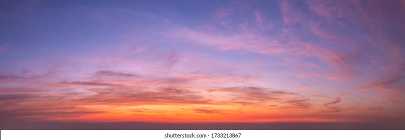 Sky sunset background panorama concept. Skyline top view Evening sunset sky and the morning sunrise In the city Colorful with copy space. Empty beautiful sky panoramic view twilight time of Bangkok
