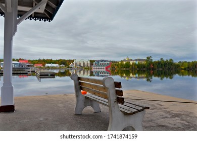 Gravenhurst, Ontario / Canada - 10/05/2008: Gravenhurst pier - park bench with the view of the lake