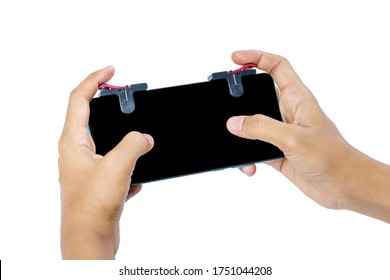 Close Up Gamer's Hand with Metal Trigger for Controller Mobile Gamepad Fire Button on White Background Isolated. POV Shot.