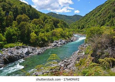 Landscape view of the majestic Buller River entering the Buller Gorge below Murchison. Famous for adventure tourist attractions and trout fishing.