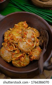 Selective Focus of Dog Fruit Spicy Sauces with anchovies or known as Balado Jengkol Teri, traditional food from Indonesia made from blended chillies, Spicy and tasty. Served in Indonesian pottery's5