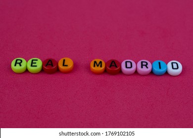 The word real madrid made of coloured letters on white background