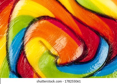 Achtergrond van gestreepte spiraal veelkleurige snoep close-up