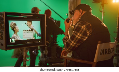 Director Gives Commands Shooting History Movie Green Screen CGI Scene with Actors Wearing Renaissance Costumes. Big Film Studio Professional Crew Shooting Big Budget Movie. Back View Shot