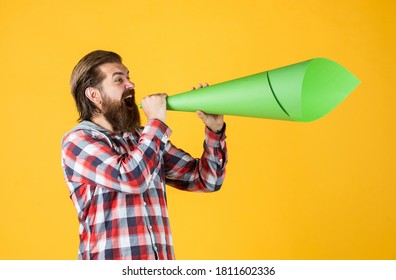 propaganda concept. urge the public. Do not be afraid to express your opinion. free man shouting into megaphone. Handsome man shouting through speaker. loud announcement. dont be silent. vote.