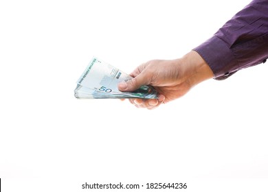 白い背景にお金を持っている手を切り取った画像