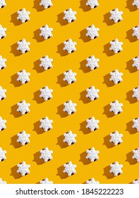 Nền liền mạch màu cam. Mô hình bông tuyết. Trang trí tối giản cho trẻ em. Trang trí hình ngôi sao màu trắng sắp xếp đối xứng bị cô lập trên màu vàng sáng.