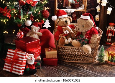 teddy bear family sitting at home by the Christmas tree at holiday time