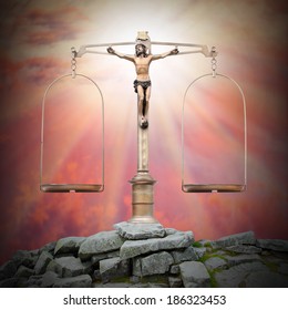Skala berat dengan Yesus Kristus di puncak. Keadilan ilahi dan konsep paskah.