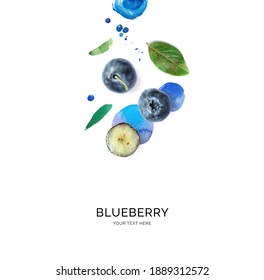 Creative layout made of blueberry on the watercolor background. Flat lay. Food concept.