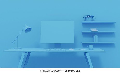 Máy tính màn hình trống trên nền màu xanh lam bàn