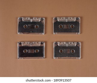 Bunch of colorful audio cassette tapes. Antique audio cassette from a few years ago that still works just fine. Outdated technology of audio recording and audio cassette format playback, top view.