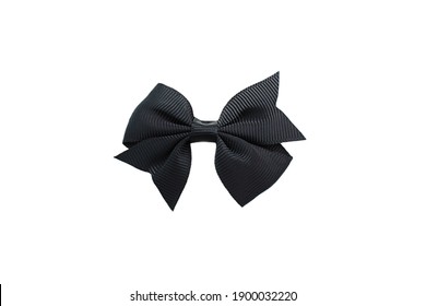 Black hair bow isolated on white.