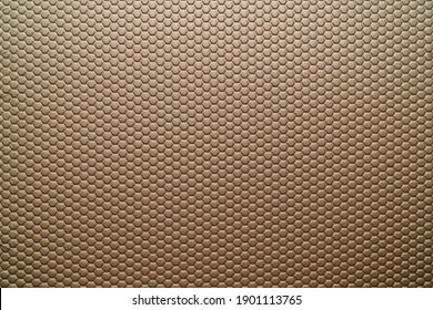 De textuur van het honingraatpatroon op plastic.