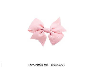 Pink hair bow isolated on white.
