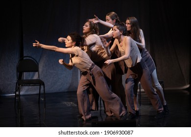 Actors and actresses play a modern lyrical performance of the theater stage show