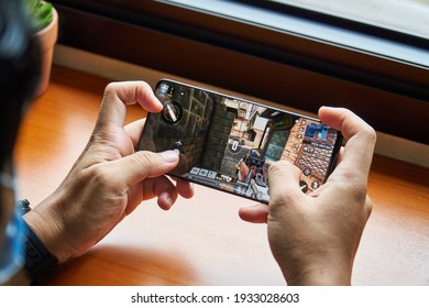 Jakarta, Indonesia - March 10, 2021: Playing free-to-play shooter video game Call of Duty: Mobile games on the Samsung Galaxy S21 Ultra flagship smartphone.