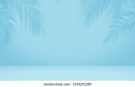 空のヤシの影の青い色のテクスチャ パターン セメント壁の背景。オンライン販売ショップのプレゼンテーション ビジネス自然有機化粧品に使用されます。最小限のコンセプトを持つ夏の熱帯のビーチ