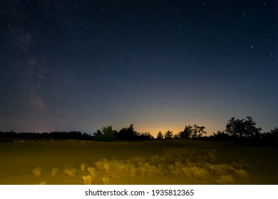 night prairie under a starry sky with milky way