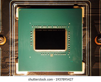 Gaming microprocessor with heatsink removed. Modern computer integrated electronics. Macro Shot of powerful chip. GPU core die no logo