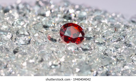 Red ruby diamonds are placed on a pile of white diamonds And keep turning. video 4k resolution shoot in studio