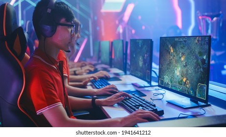 Pro Girl Plays Computer Game Plays RPG Strategy on a Championship. Diverse Esport Team of Pro Gamers Play in Mock-up Video Game. Stylish Neon Cyber Games Arena. Side View