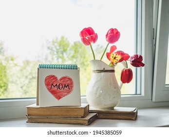 Happy Mothers Day. Beautiful greeting card. Close-up, view from above. Holiday concept. Congratulations for family, relatives, friends and colleagues