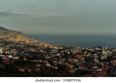 Funchal cityscape at dusk, Saint Anthony church, view to atlantic ocean - Madeira Island, Portugal
