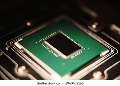 Gaming microprocessor with heatsink removed. Modern computer integrated electronics. Macro Shot of powerful chip. GPU core die no logo