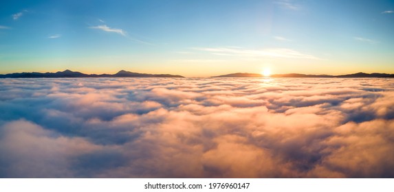 Fog and Clouds over Mountain Landscape 2K wallpaper download