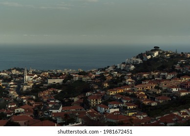 Saint Anthony church, Funchal cityscape at dusk, view to atlantic ocean - Madeira Island, Portugal