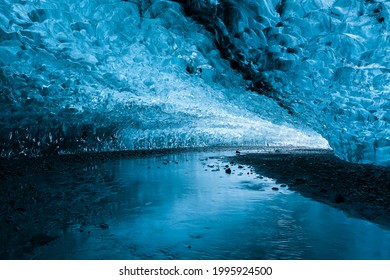 Spectacular, vibrant blue glacial ice inside an ice cave in Iceland