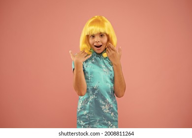 Anime admirer. Girl yellow wig. Cosplay character concept. Japanese style. Eastern trends for teens. Hobby and entertainment. Pop culture. Anime fan. Child cute cosplayer. Anime emotional expression