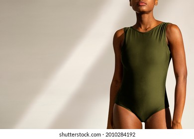 One-piece green swimsuit women's summer fashion with design space