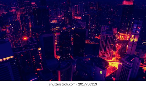 Aerial view of the skyscrapers of the city of Kuala Lumpur in the style of the 80s, neon colors. Wide shot 