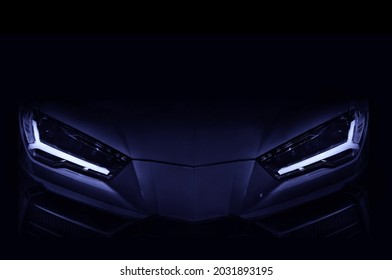 Silhouet van zwarte sportwagen met LED-koplampen op zwarte achtergrond, kopieer ruimte