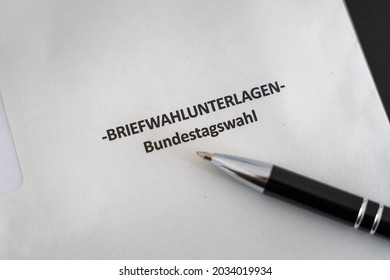 Documents for postal voting for the Bundestag election 2021 in Germany. Voting a political party for the government. Envelope with the ballot paper inside.