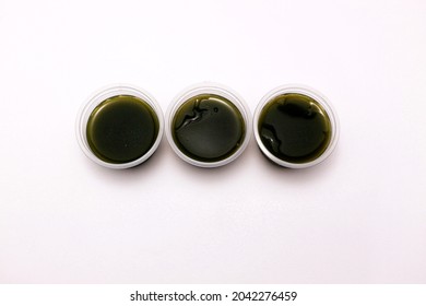 Jakarta, Indonesia, September 16, 2021, a product picture of grass jelly or cincau in some plastic cups or gelas plastik is taken from a top view angle.