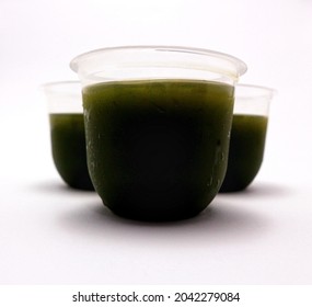 Jakarta, Indonesia, September 15, 2021, a product picture of grass jelly or cincau in a plastic cup or gelas plastik is taken from a side view angle. 